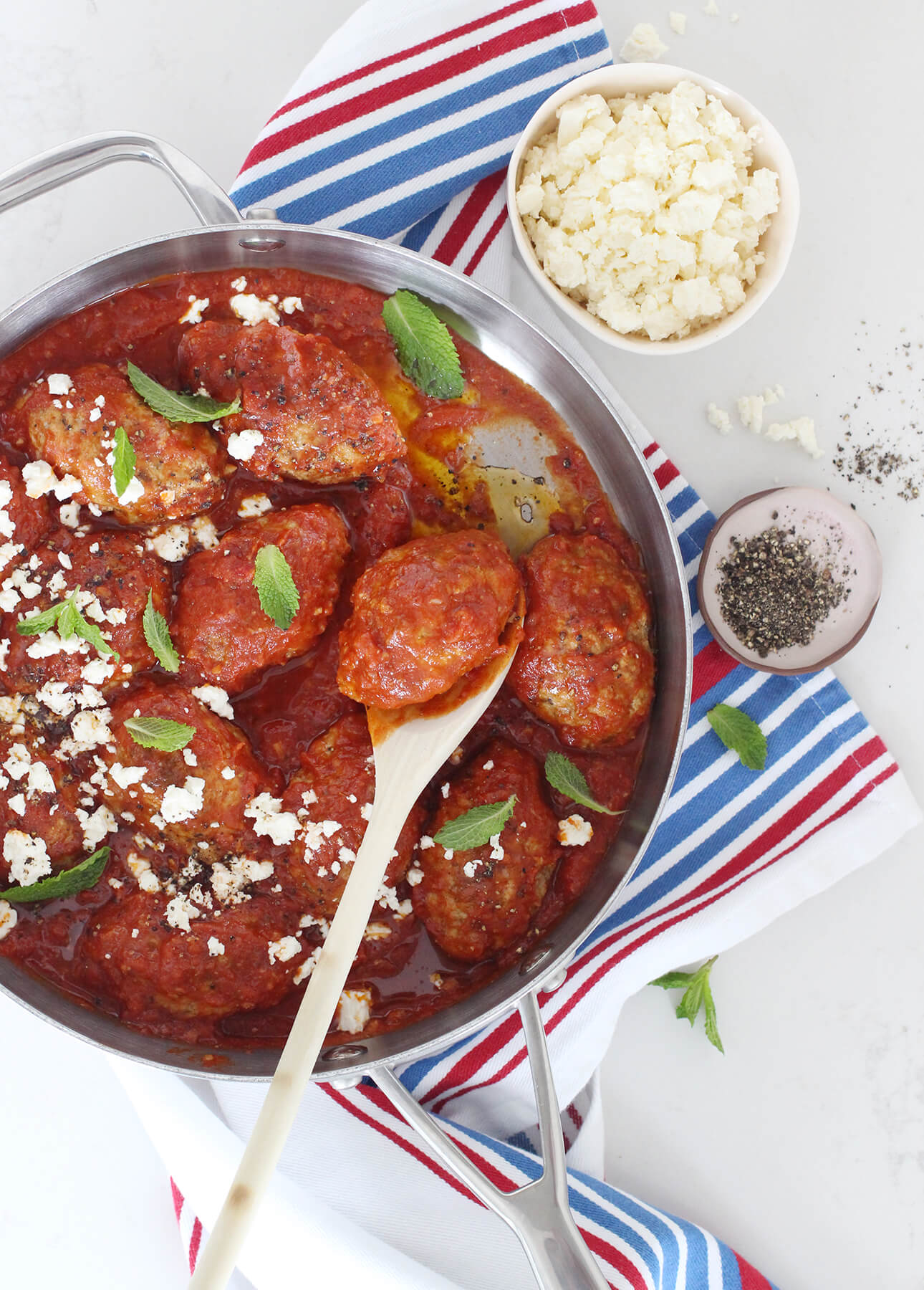 These Greek meatballs are hearty, tender and moist, and they come nestled in an intriguingly spiced tomato sauce