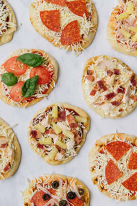 This Mini Naan Pizza is so easy to make, kids won’t just love eating them, but they’ll love helping to make them, too!