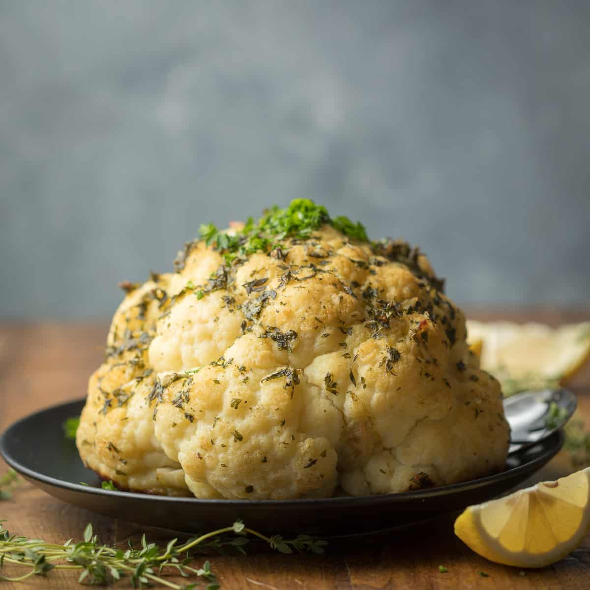 Whole Roasted Cauliflower with Garlic & Herbs